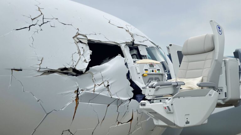 Airplane in distress, luxury seat dismantled, airline industry struggles.