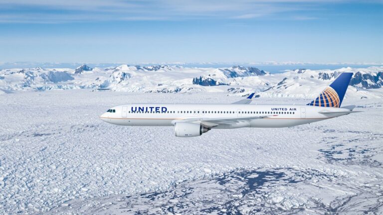 United Airlines plane flying over Arctic glaciers.