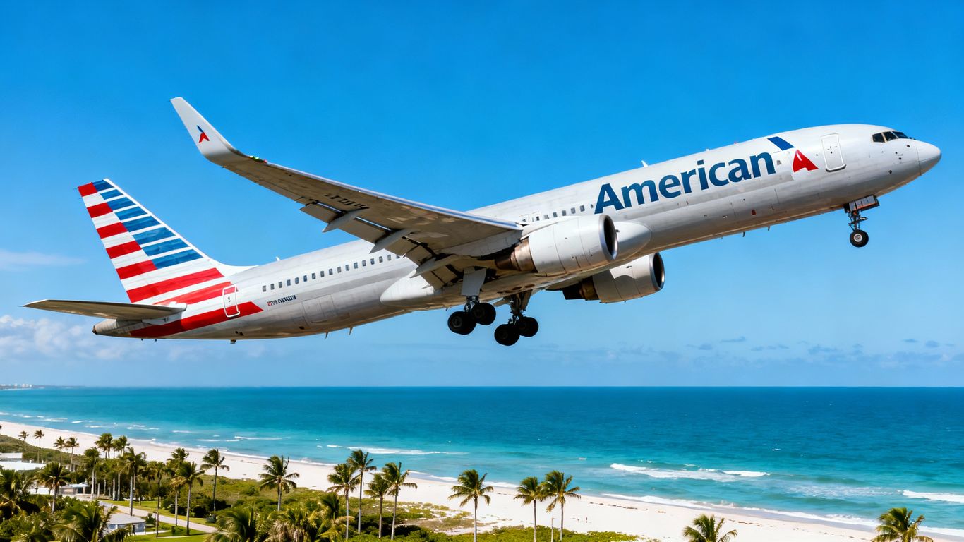 American Airlines jet flying in a blue sky.