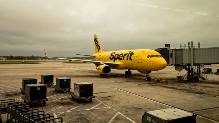 Spirit Airlines plane grounded on empty airport tarmac