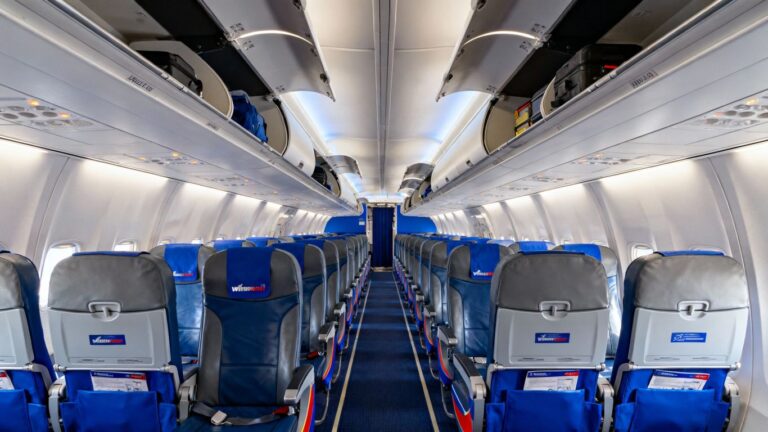 Southwest Airlines plane interior with new seats and amenities.